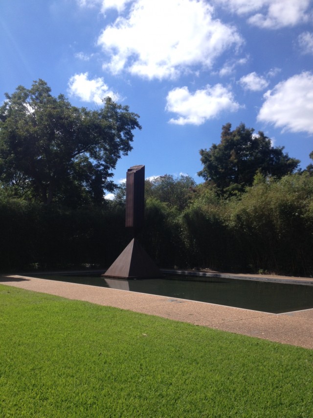 Barnett Newman's "Broken Obelisk" in a reflecting pool outside of the Rothko Chapel